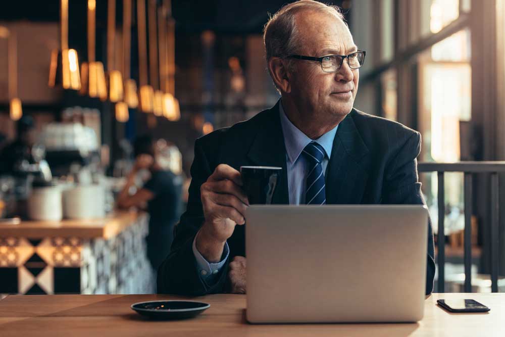 AdobeStock coffee older male executive 230462872 1000x667 1 Curve Content